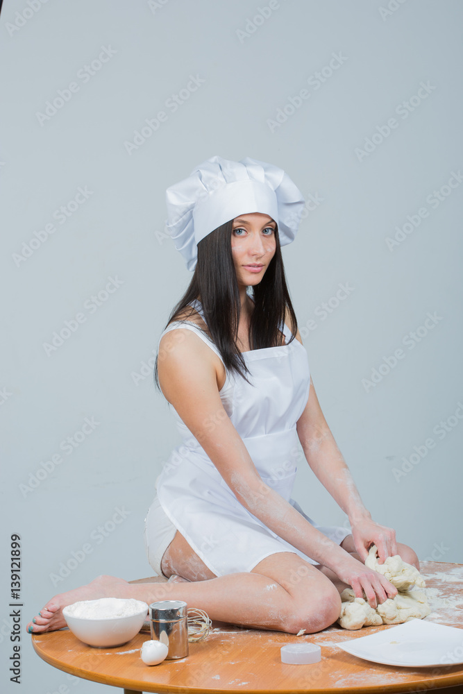 sexy woman chef uniform knead the foto de Stock | Adobe Stock