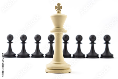 Chess business concept, leader & success. White king in front of black pawns