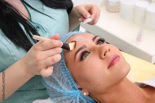 Beauty salon, facial peeling mask with retinol and fruit acids.