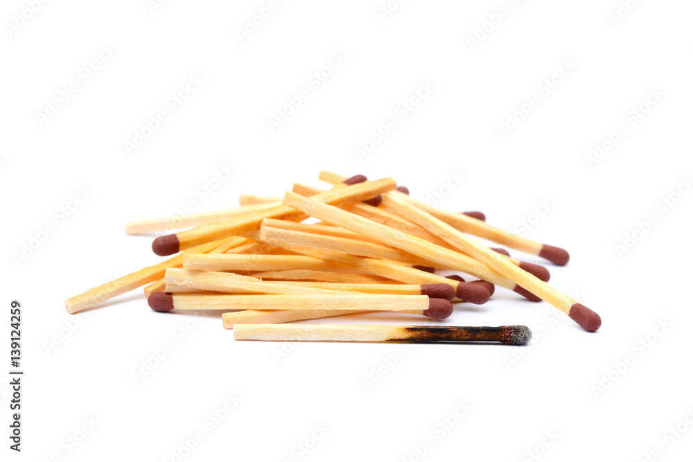 Laid used matchsticks isolated on white background Laid used matchsticks isolated on white background