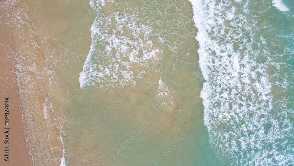 Foam waves run to the beach Foam waves run to the beach
