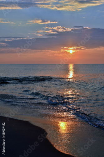 Serene Summer Seas at Sunrise at the Shore