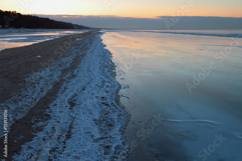 Coast of Gulf of Riga in winter evening. Jurmala, Latvia