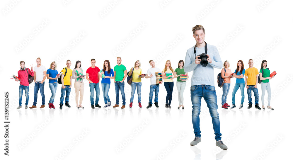 Obraz premium Large group of teenage students isolated on white background. Many different people standing together. School, education, college, university concept.