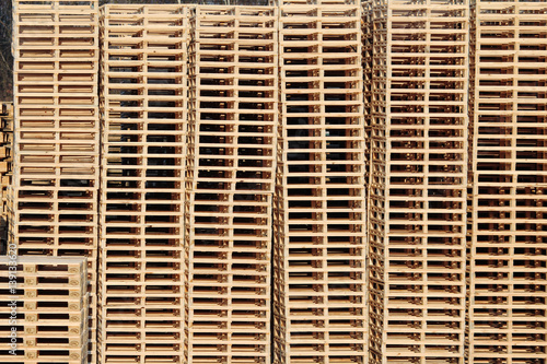 wooden pallets on stock in factory backyard