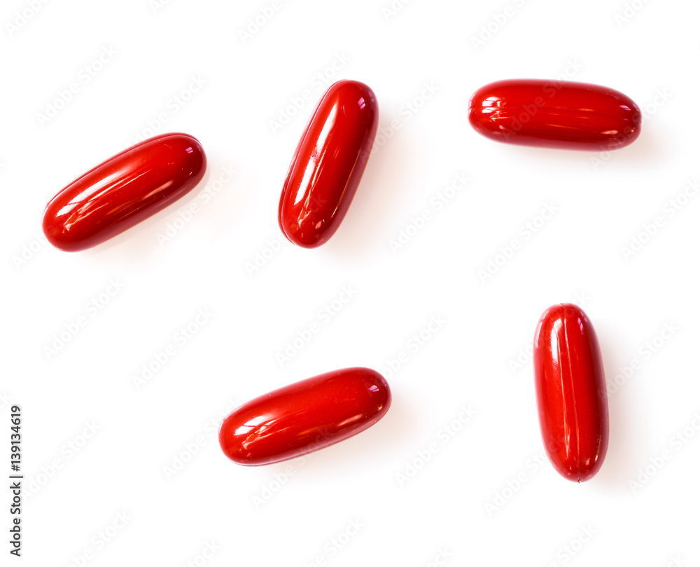 red pills on a white background red pills on a white background