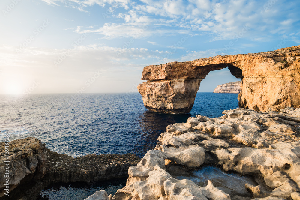 Famous stone arch formation. Landscape view in Malta, Europe during sunset. Azure Window.