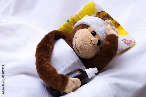 a toy monkey is sick