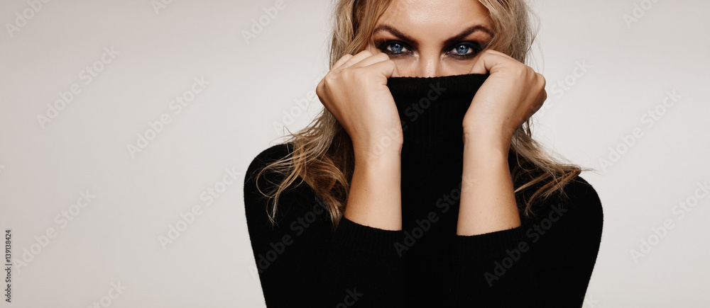 Beautiful young woman with smokey look Beautiful young woman with smokey look
