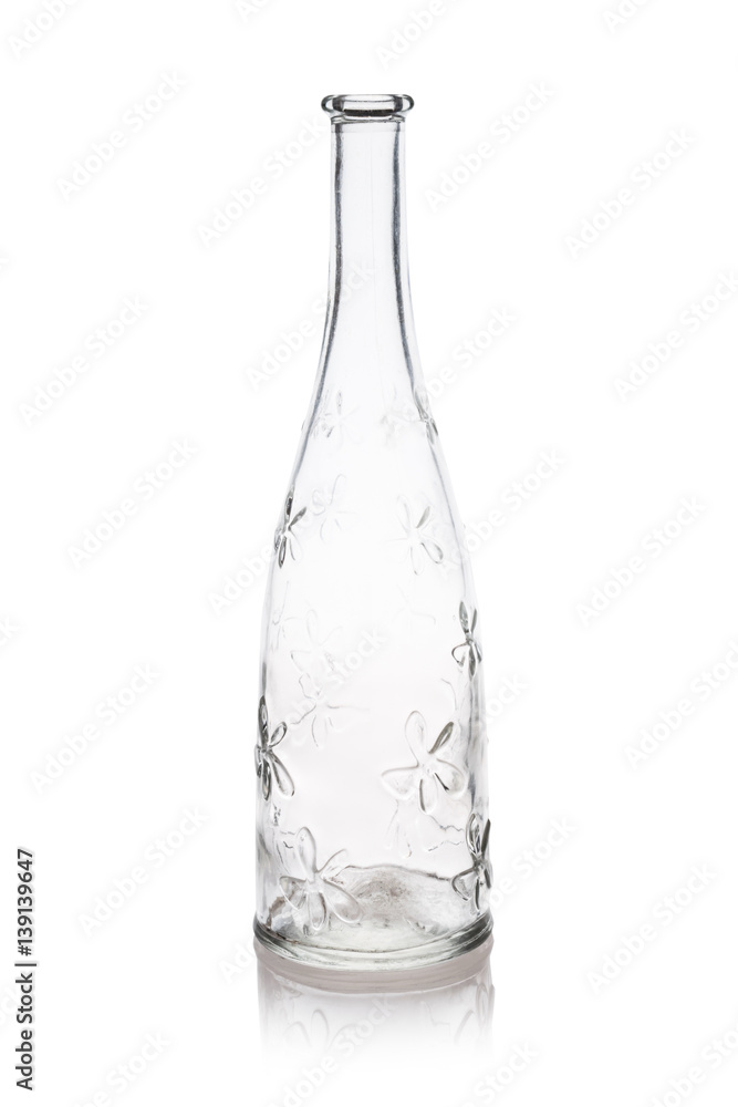 Glass vase shaped as a bottle with flowers pattern isolated on white background Glass vase shaped as a bottle with flowers pattern isolated on white background