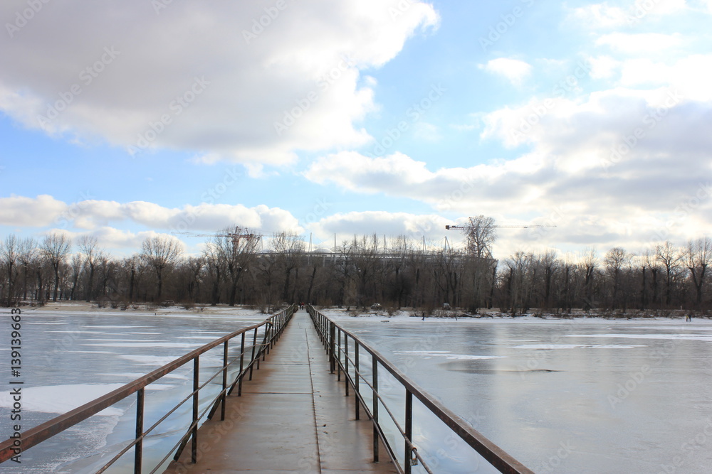 Naklejka premium the metal bridge over the river