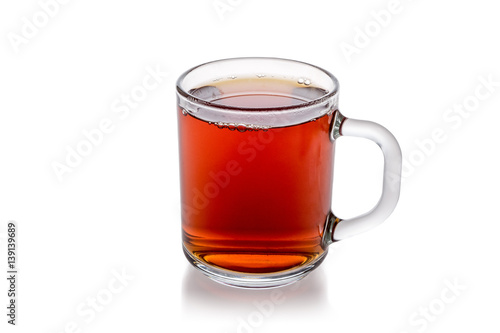 Transparent glass cup of tea isolated on white background