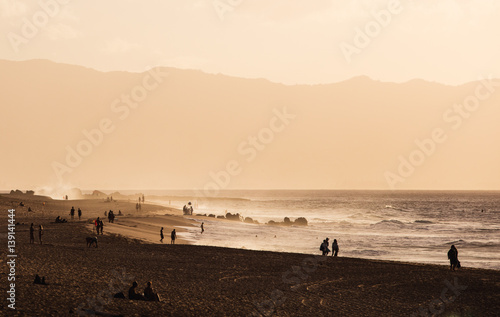 People enjoying at the beach