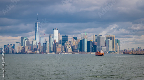 Staten Island Ferry and Lower Manhattan Skyline - New York, USA © diegograndi