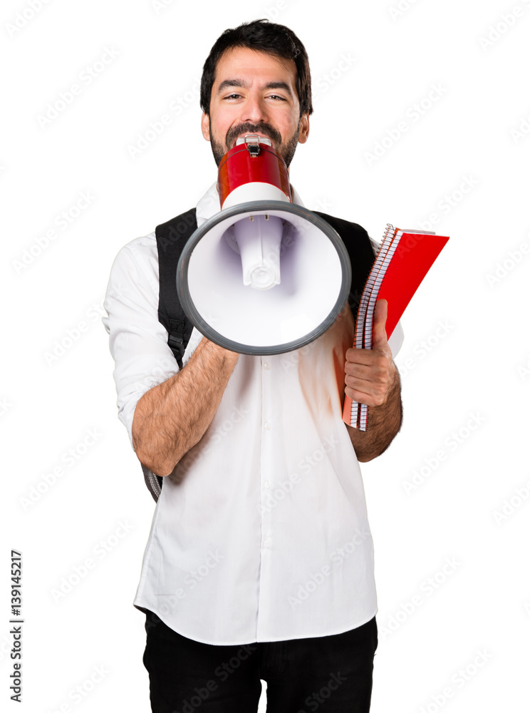 Student man shouting by megaphone Student man shouting by megaphone