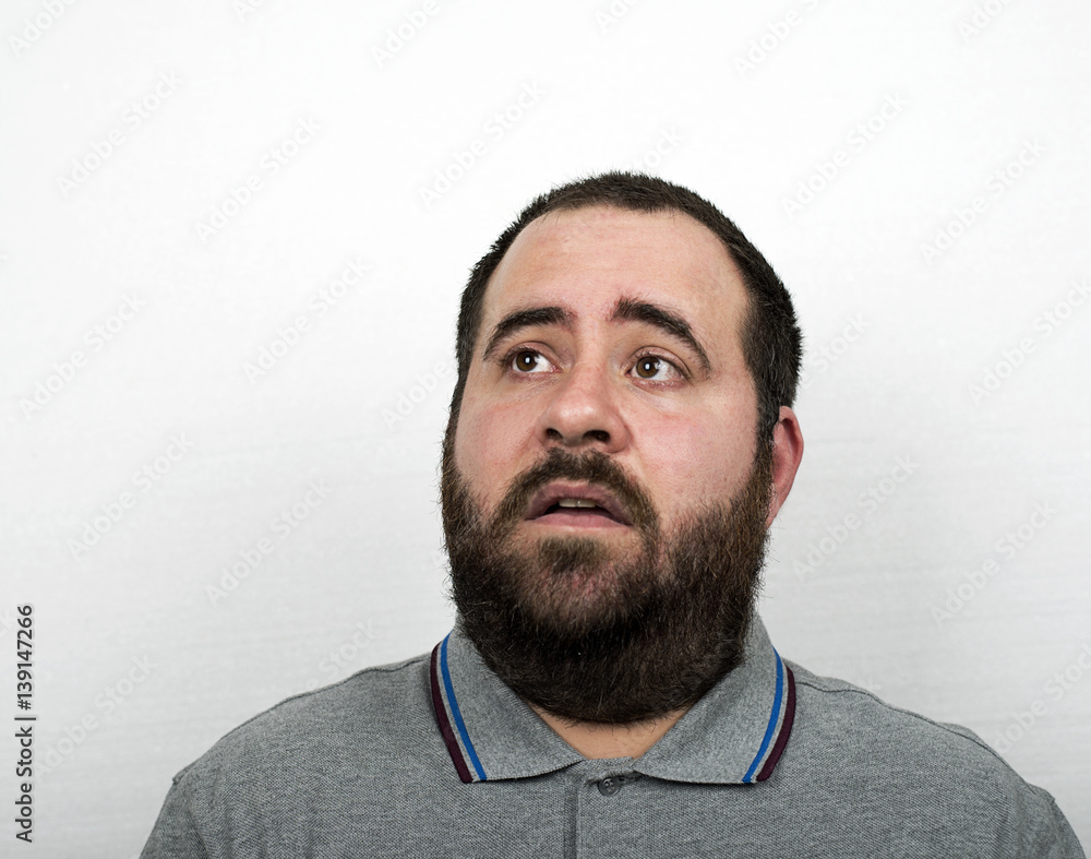 Obraz premium Young man with beard with surprise gesture. Isolated.