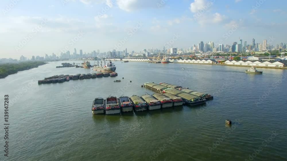 fly over river container cargo ship, import export, business logistic supply chain transportation concept for shipping aerial view wide background, 4K fly over river container cargo ship, import export, business logistic supply chain transportation concept for shipping aerial view wide background, 4K