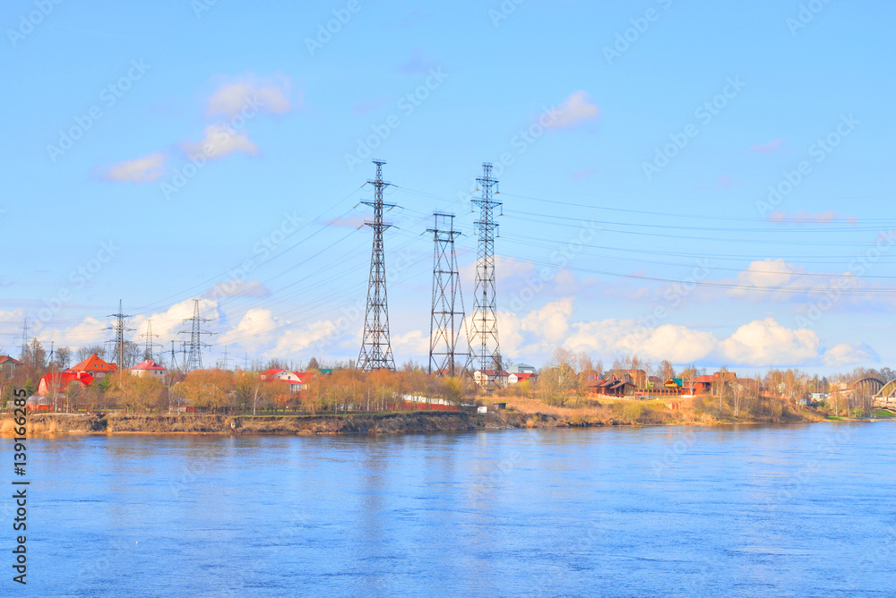 Power line and Neva River at early spring. Power line and Neva River at early spring.