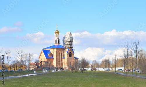 Park in Rybatskoe and The Church of the Nativity of the Blessed Virgin Mary. photo