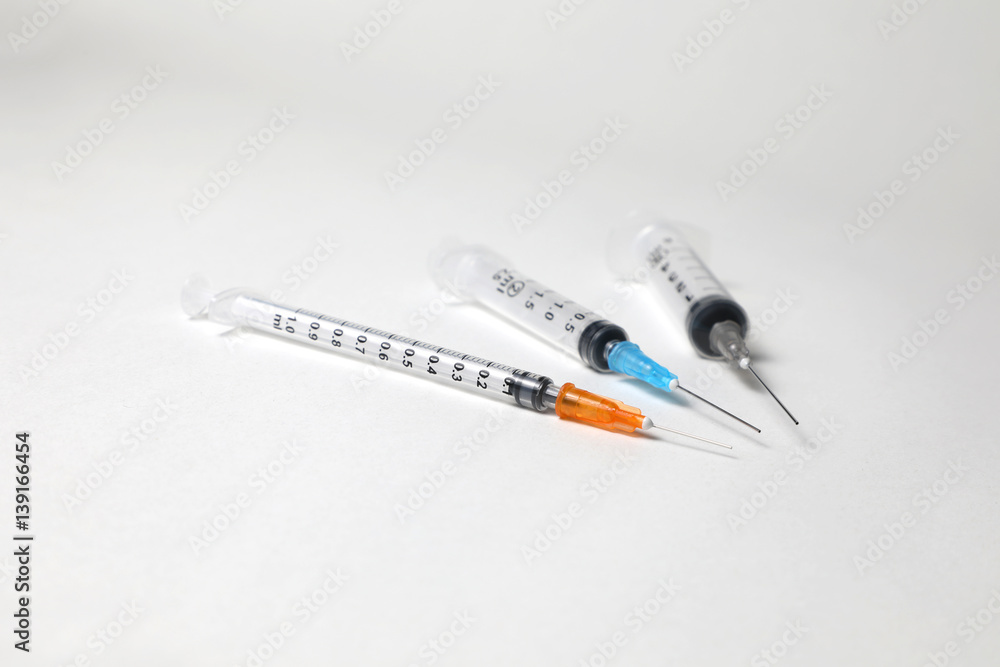 Obraz premium injections on the white table