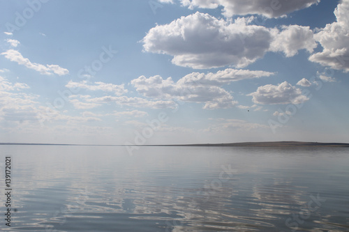 the sky reflected in the water  deserted beach lake  summer sky  nature  blue cloud 