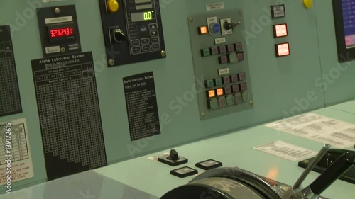 Wallpaper Mural Navigation elements inside of the bridge of a cargo ship. The bridge of the cargo ship is the platform from which the ship is commanded. Torontodigital.ca