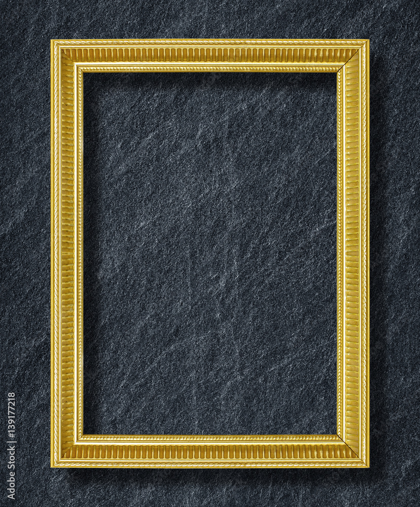 Fototapeta premium gold frame on black slate background