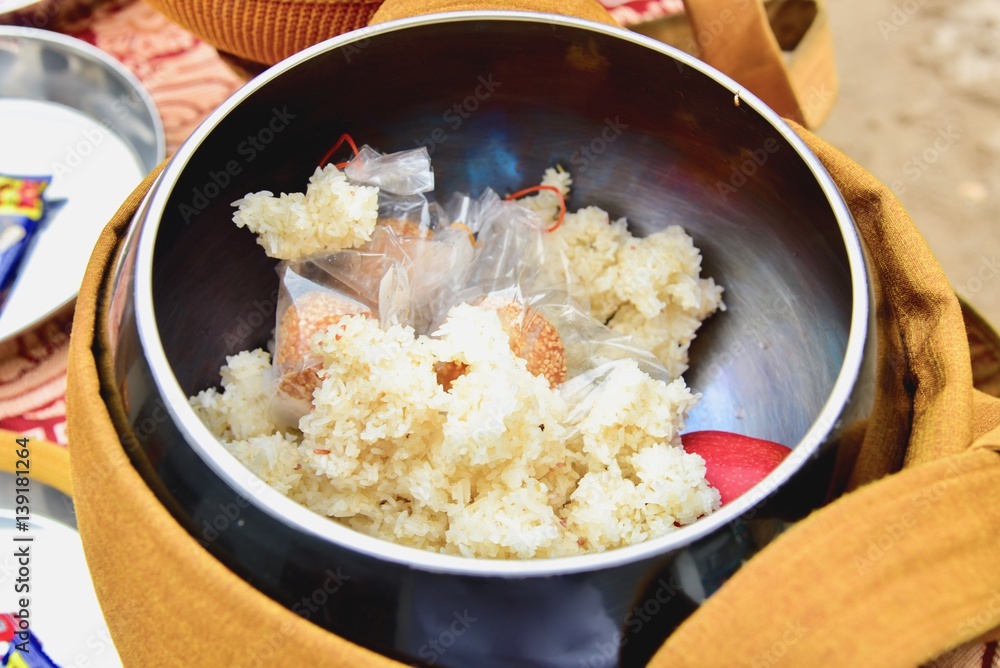 Stainless Steel Alms Bowl Filled with Sticky Rice Stainless Steel Alms Bowl Filled with Sticky Rice