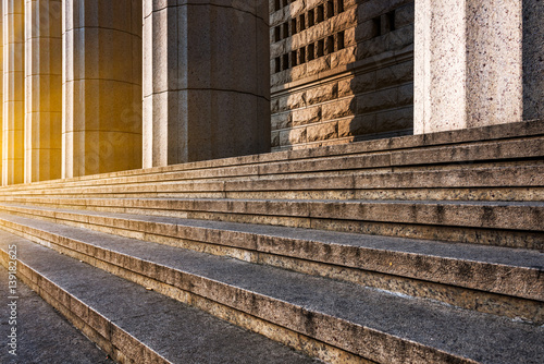 steps front of vintage building in city of China.