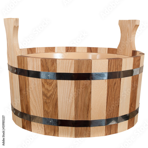 Empty isolated wooden tub for a bath on a white background