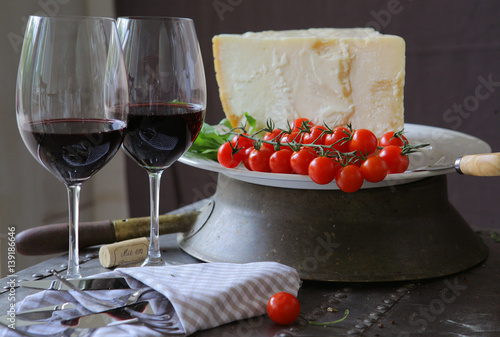 red wine with Parmesan cheese and cherry tomatoes