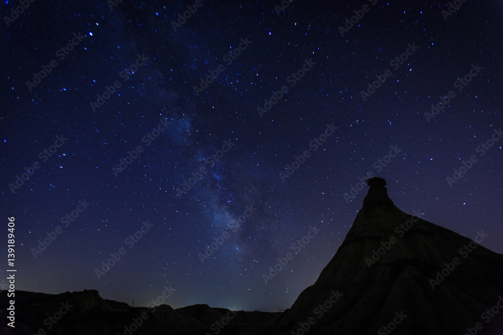 Milky way over Castildetierra, desert landscape in Bardenas Reales of Navarra, Spain