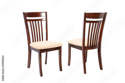 Wooden comfortable brown chairs isolated on white background