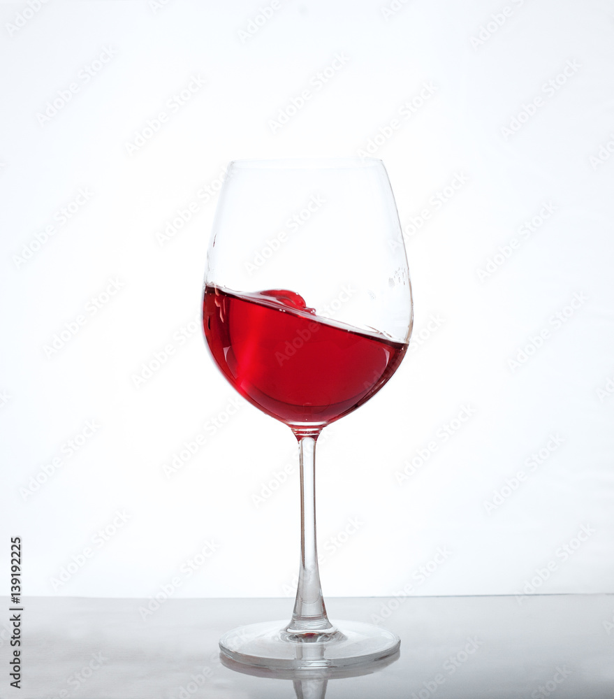 Red wine in the glass. The concept of alcohol and party. Red wine in the glass. The concept of alcohol and party.