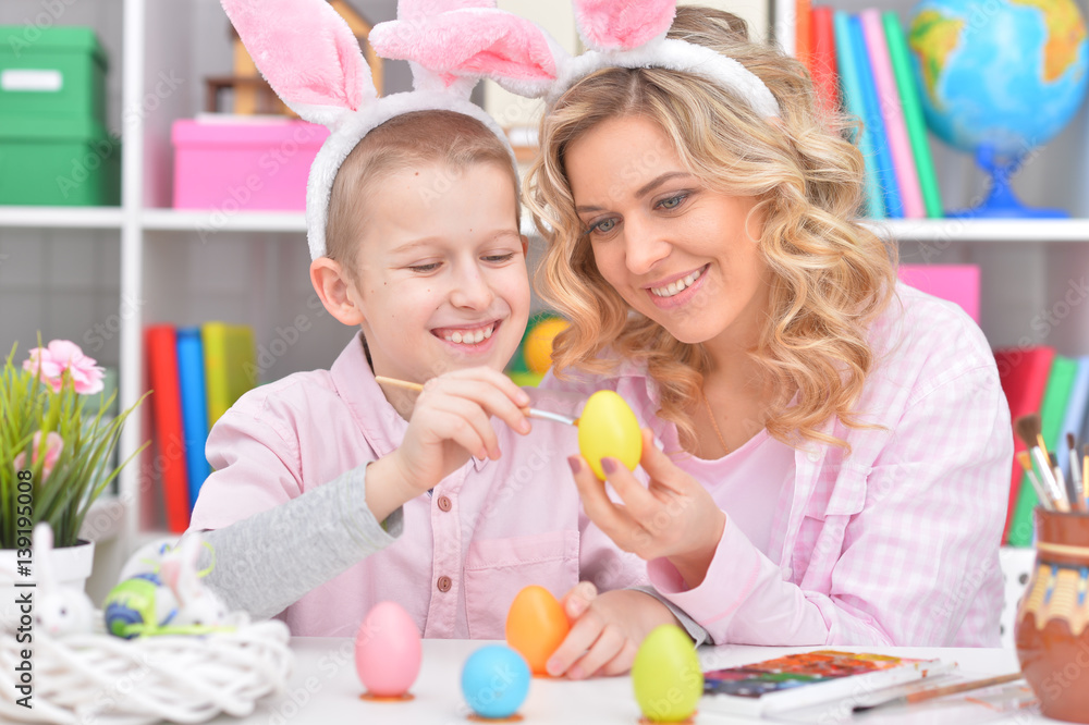 Happy family preparing for Easter Happy family preparing for Easter