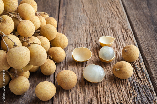 longan fruit on wood table brown with copy space