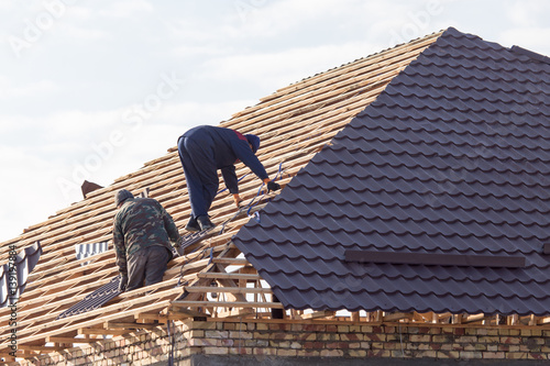 Wallpaper Mural workers working on the roof Torontodigital.ca