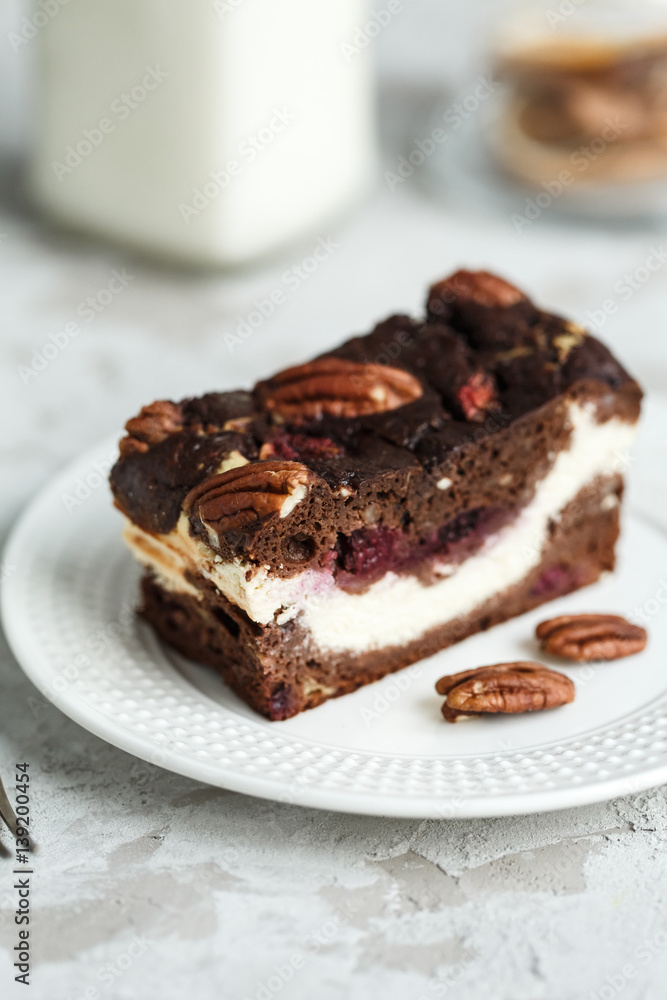 Dessert brownie-cheesecake with nuts Dessert brownie-cheesecake with nuts