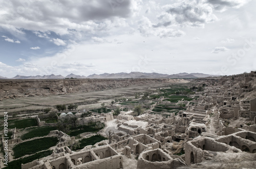 Ruins of old houses in desert. Iran. photo