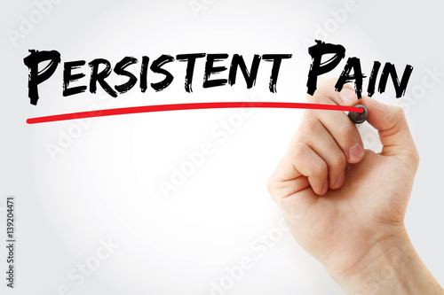 Hand writing persistent pain with marker, concept background
