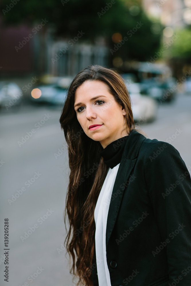 Woman waiting on crossroad Woman waiting on crossroad