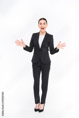 Shocked businesswoman gesturing