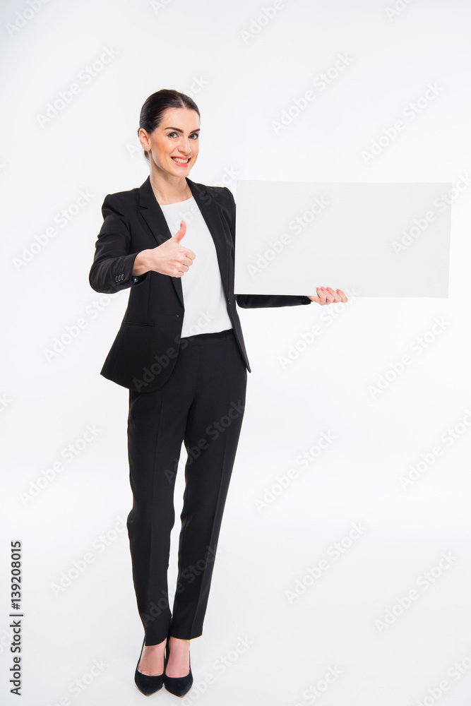 Businesswoman holding blank card Businesswoman holding blank card