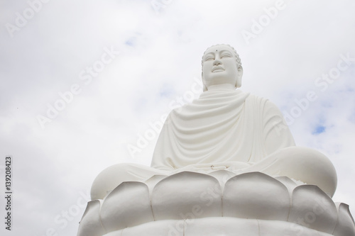 Sitting white Buddha in Long Son Pagoda, Nha Trang, Vietnam