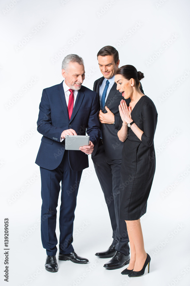 Businesspeople using digital tablet Businesspeople using digital tablet