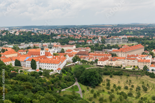 Top view to old town, historical districts and red roofs of Prague, Czech republic from an observation deck on Petrin hill.