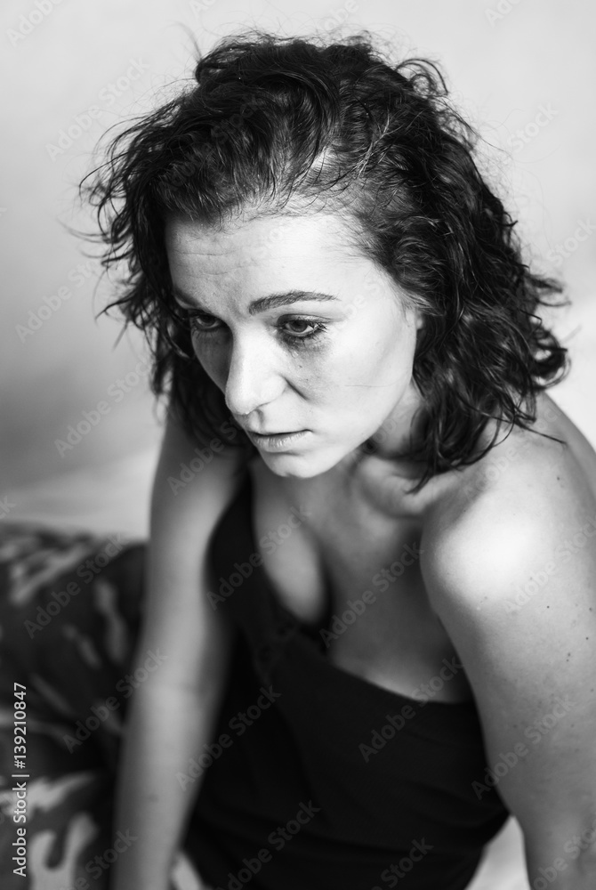 Confused girl with tears. Black and white photography