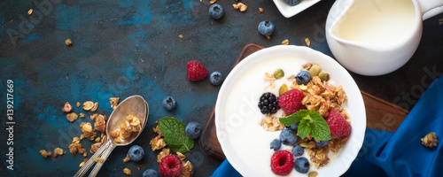 Greek yogurt with granola and fresh berries. Healthy food.