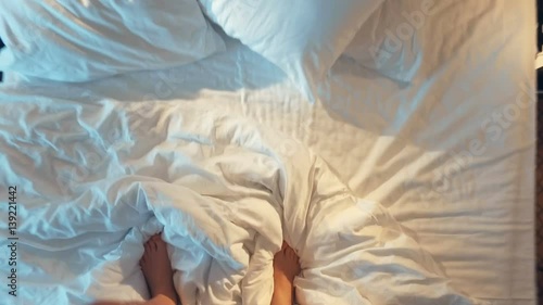 Wallpaper Mural man jumping on the bed spread out Torontodigital.ca