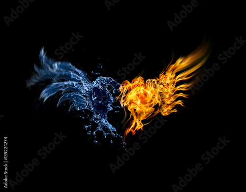 Burning heart. Heart in fire and water isolated on black background
